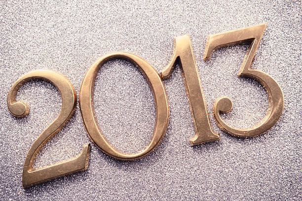 istock Gold 2013 New year text on shiny background 174926191