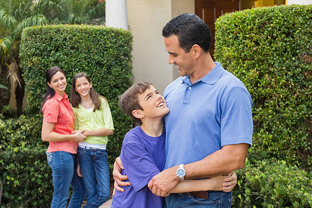 istock Son Embracing Father In Lawn 174927514