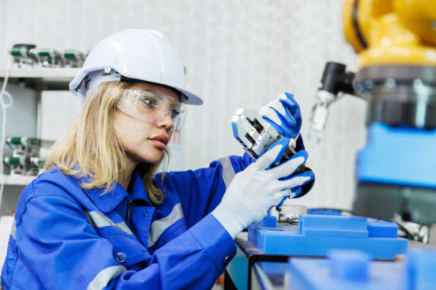 istock female automation machine engineer student study and inspection control robot arm machine in university or factory workshop. ai robot technology new innovation trend of manufacturing in industry 5.0 1749275809