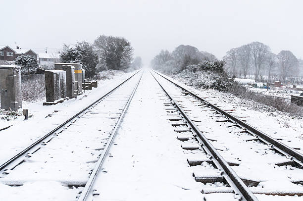 istock Railway Tracks In The Winter Snow 174927760