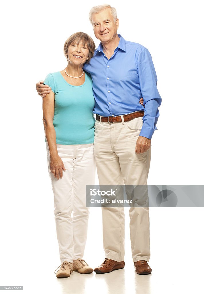 couple Senior embrassant - Photo de Fond blanc libre de droits