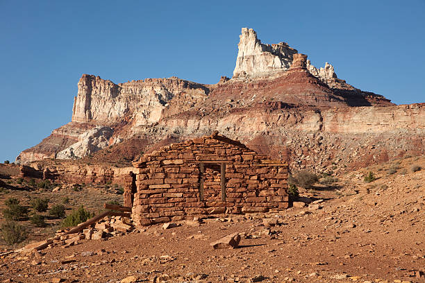 A 1910 miner's rock cabin stands at Temple Mountain Uranium mining area in the Castle Valley and is where Madame Curie is said to have visited and stayed during her visit to see where the vanadium ore was mined that she used in her cancer treatments in France. The area was a hot spot for Uranium prospecting during the late 1940s.