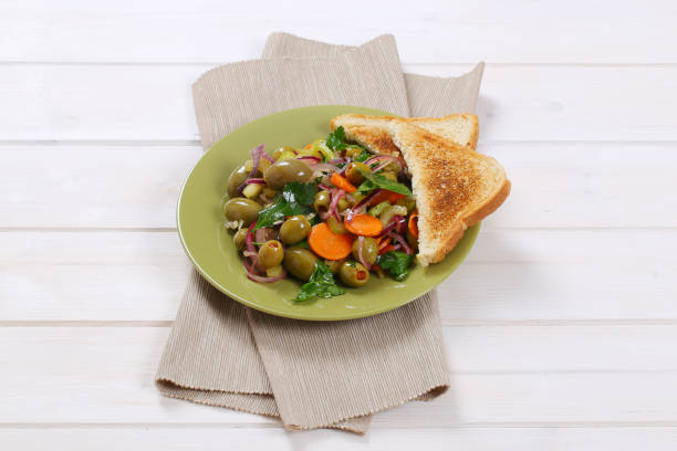 Plate of Sicilian olive salad and toasted bread