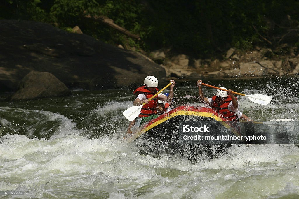 White Paddle Boaters get ready to hit the last rappid on the lower New River. Concepts Stock Photo