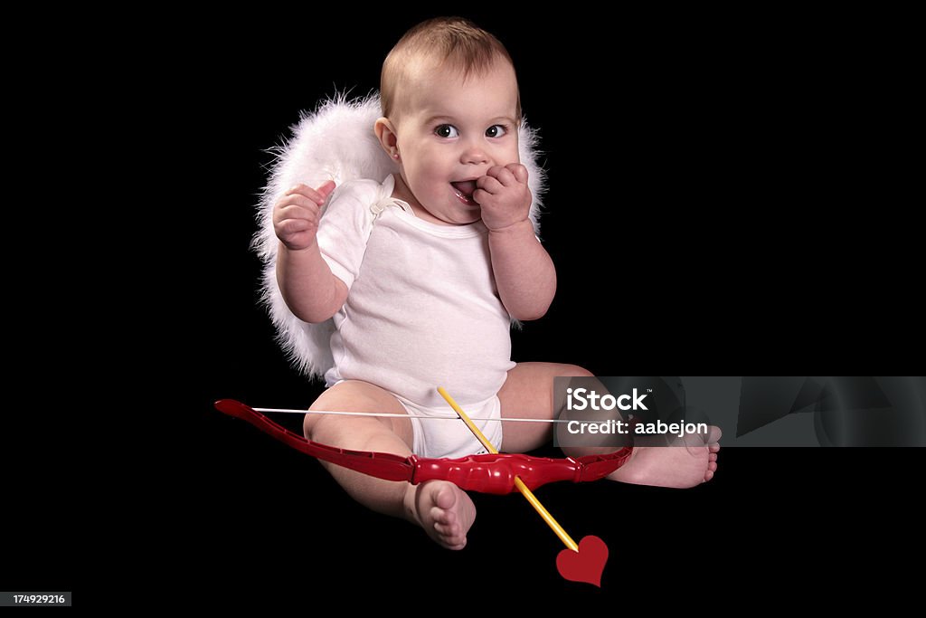 I'm Gonna Get You! Baby Cupid. Please view all pictures of this Baby - Human Age Stock Photo