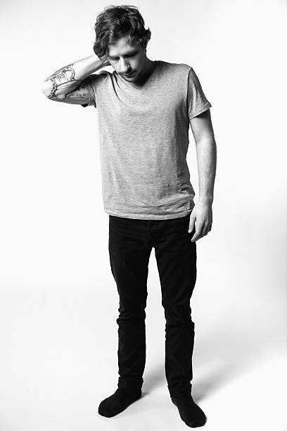 istock Young Attractive Caucasian Tattoo Hipster Man on White Background 174929764