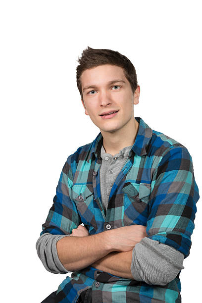 istock Young man with relaxed open expression wearing plaid shirt 174929784