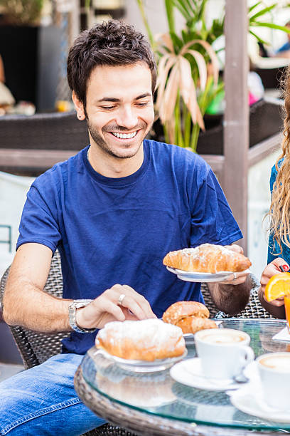 istock Young Man Hungry for Italian Breakfast 174930126