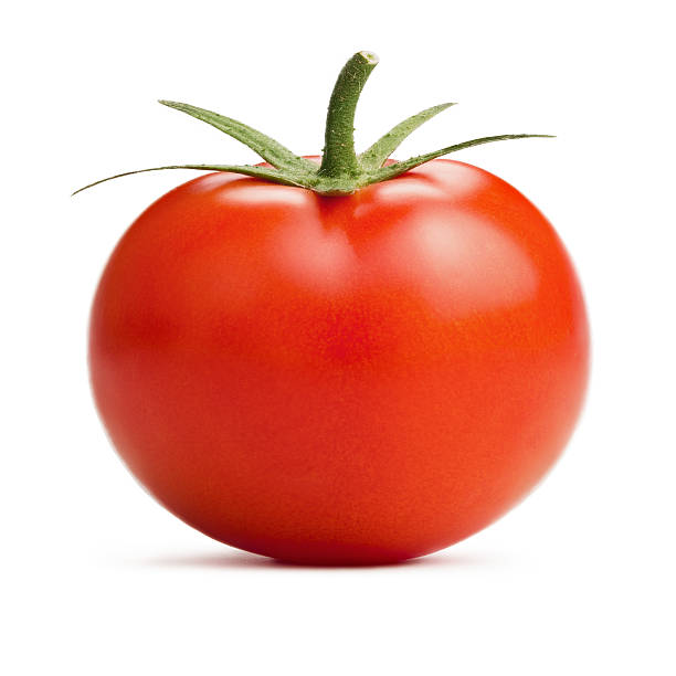 tomate - isolated on red fotos imagens e fotografias de stock