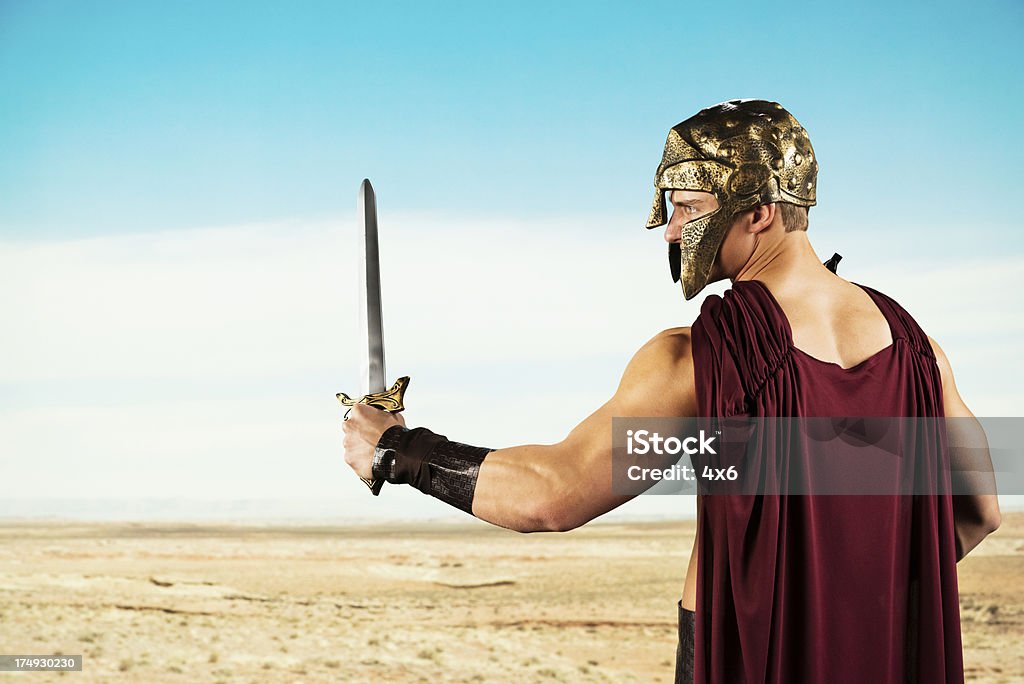 Guerrier Spartan avec épée de bataille - Photo de Gladiateur libre de droits