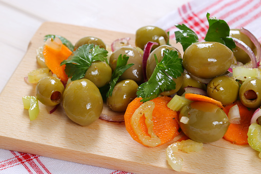Sicilian olive salad on cutting board