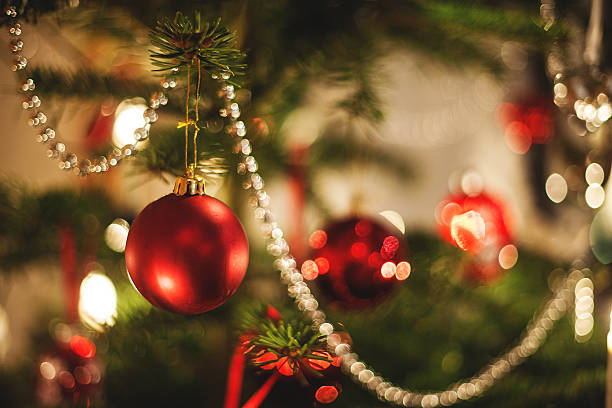 istock Christmas bauble close up hanging in tree 174930822