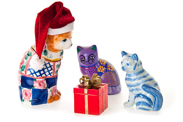 istock Three Porcelan Cats with Christmas Gift 174930976