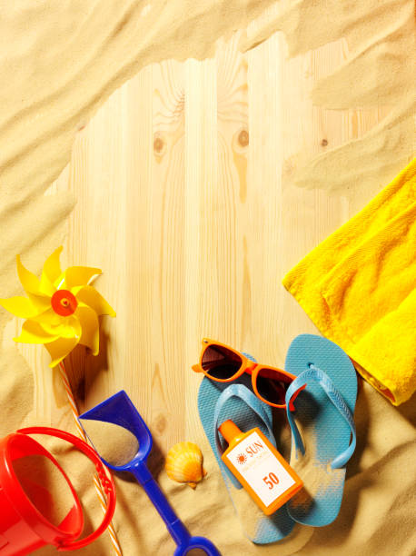 istock Sun Cream with Flip Flops and Sunglasses on Sand 174931579