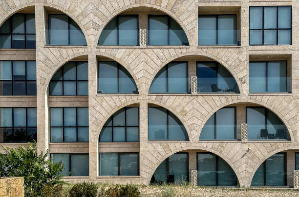 Modern architecture details with arched windows. Closeup building