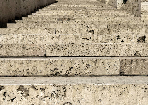 istock Old tufa stairs up closeup. Ancient steps 1749318783