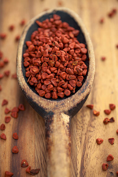 annatto semilla - achiote fotografías e imágenes de stock