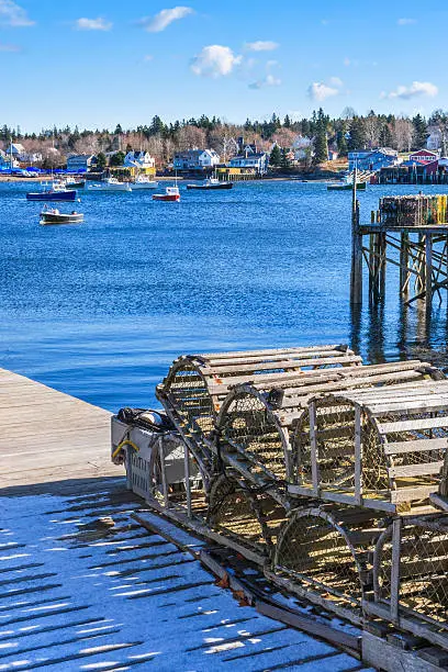 Photo of early winter, snow, lobster traps, dock, fishing village, harbor