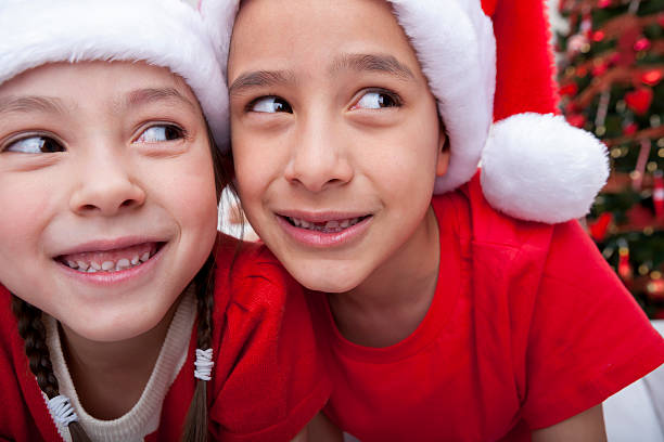 istock Young boy and girl bonding during Christmas break 174933679