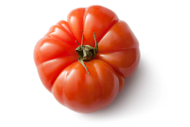 legumes: tomate heirloom - tomato heirloom tomato vegetable isolated - fotografias e filmes do acervo