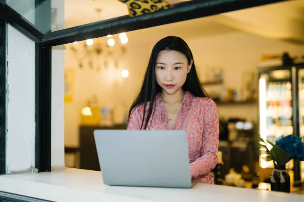 istock Beautiful Asian women use laptops at home 1749355798
