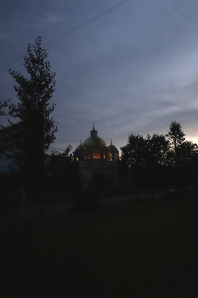 istock Church domes with light in the windows at dawn in the park 1749370131