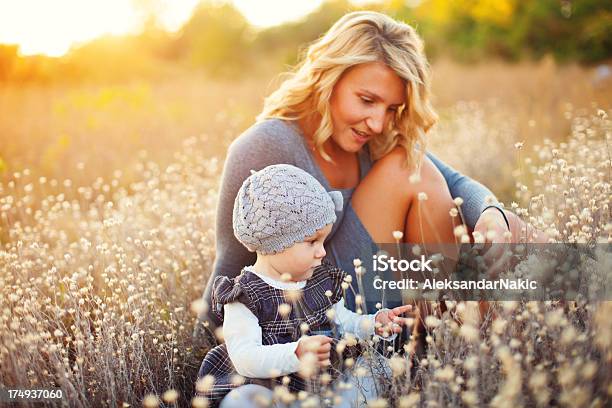 Motherhood Stock Photo - Download Image Now - 12-23 Months, Adult, Autumn