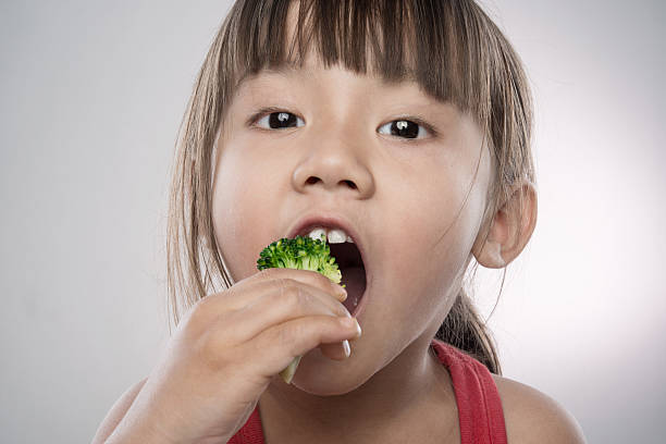 istock Little girl with vegetable. 174937175