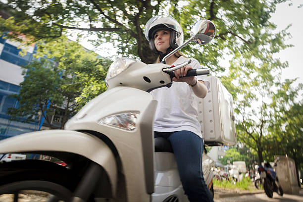 istock Delivering fast food on Motor scooter 174937283