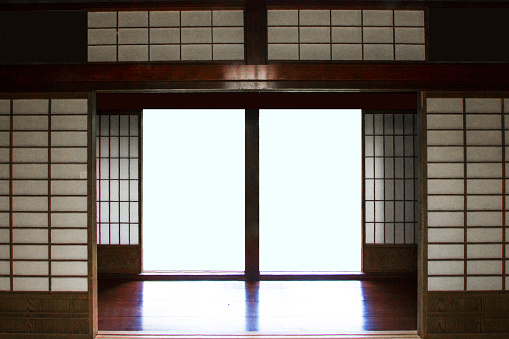 Interior of traditional Japanese house with rice paper doors and white background in the middle