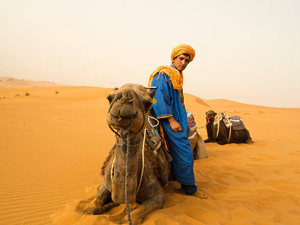 istock Bedouin and  camels 174937913