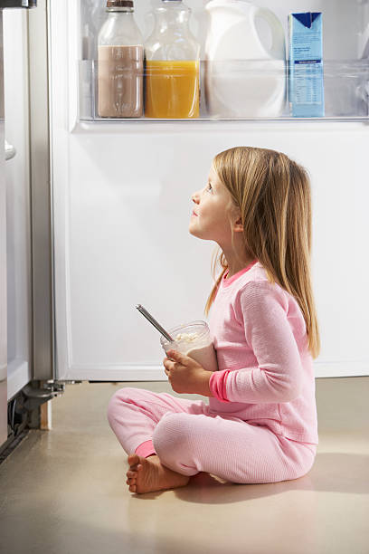 istock Girl Raiding The Fridge 174938334