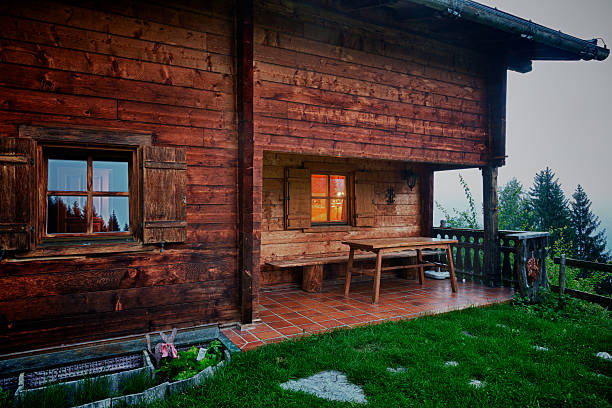 istock alpine hut at rainy evening 174938826