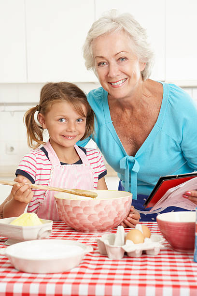 istock Grandmother And Granddaughter Baking In Kitchen 174939173
