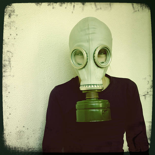 istock Girl with gas mask 174939253