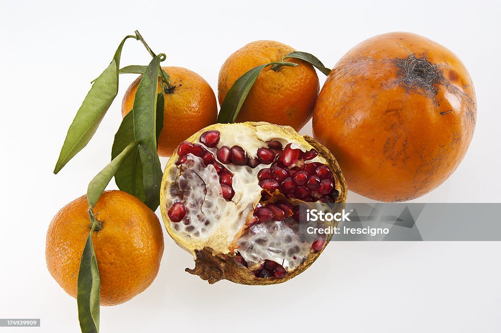 Melagrana -tangerines -khakis - Foto stock royalty-free di Alimentazione sana