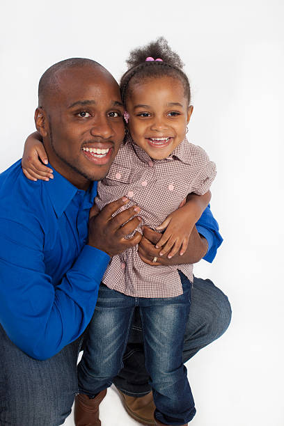 istock African American father and daughter on a white background. 174939997