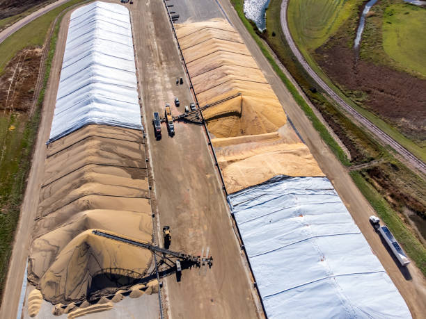 istock Drone view over grain storage piles being filled and covered 1749402730