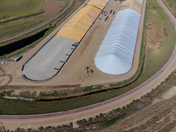 istock Drone view over grain storage piles being filled and covered 1749403791