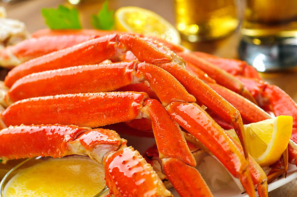 Snow Crab Legs Snow crab legs plate - Please see my portfolio for other food related images. snow crab photos stock pictures, royalty-free photos & images