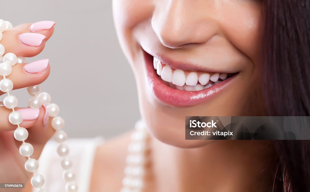 Sorriso bianco perla - Foto stock royalty-free di Bianco