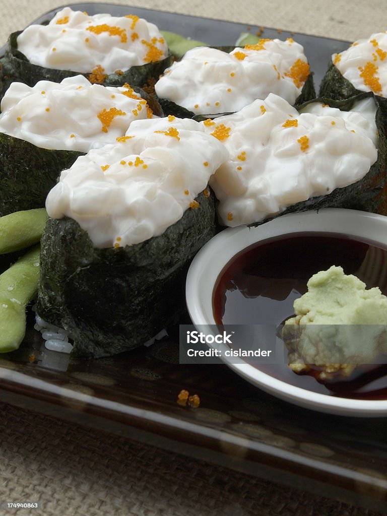 Crema Tiradores rollos de Sushi - Foto de stock de Arroz - Comida básica libre de derechos