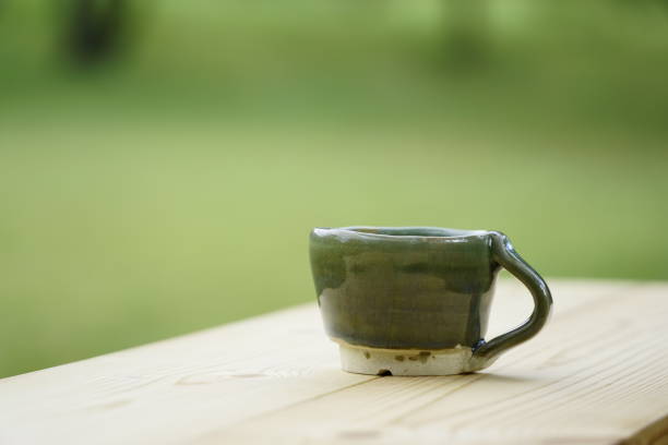 istock One coffee cup in the forest on the table 1749409664