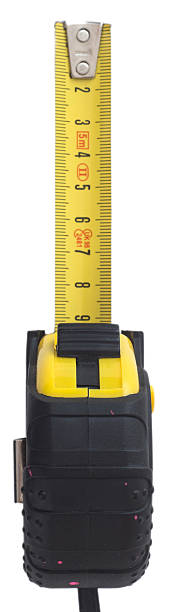 istock yellow tape measure on white background 174941445