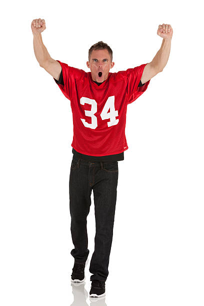 istock Sportsman shouting with arms raised 174941732