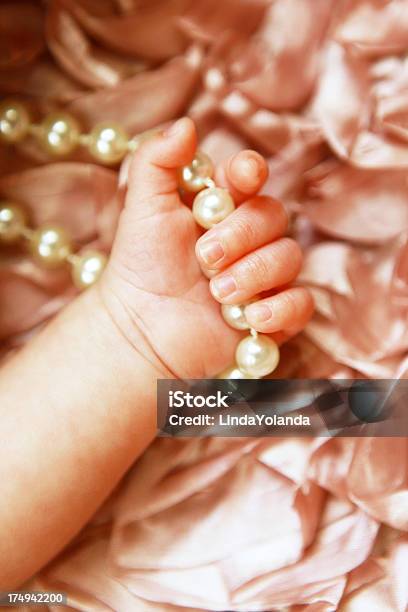 Newborn Babys Hand Gripping Pearls Stock Photo - Download Image Now - 0-1 Months, Babies Only, Baby - Human Age