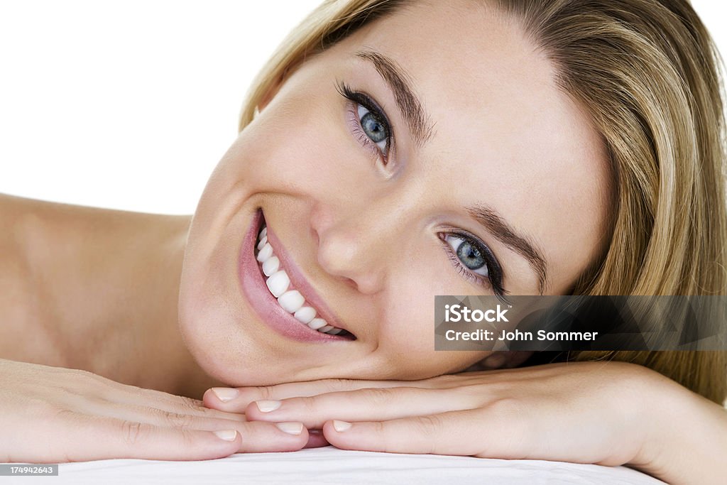 Closeup of a beautiful woman Headshot of a beautiful blond woman laying down for spa concept Human Face Stock Photo