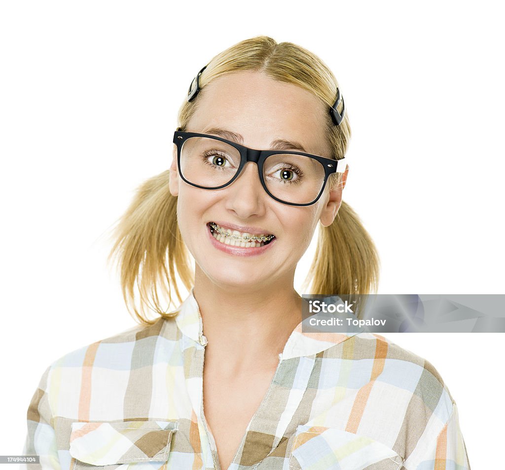 Nerd Portrait of blonde woman dressed as nerd Dental Braces Stock Photo