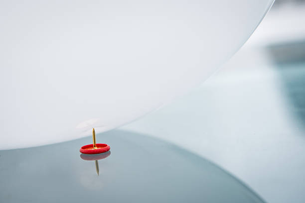 Busting a baloon stock photo