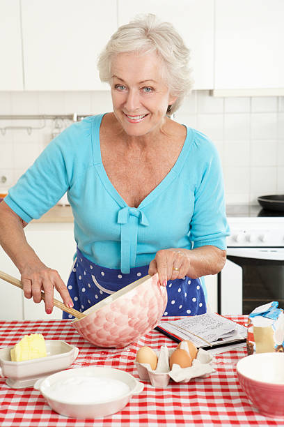 istock Senior Woman Baking In Kitchen 174944956